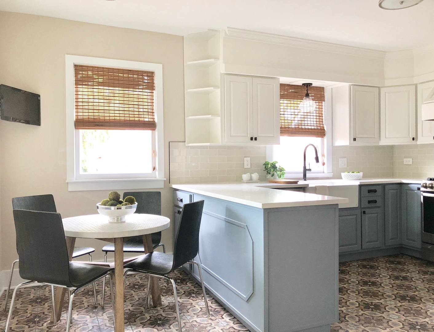 96 North Delaplaine Road Riverside, IL 60546 - Photo 10 of 25 a kitchen with a table chairs sink and cabinets