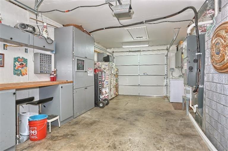 305 South Rose Street Phoenix, OR 97535 - Photo 28 of 35 One car garage offers built in cabinets