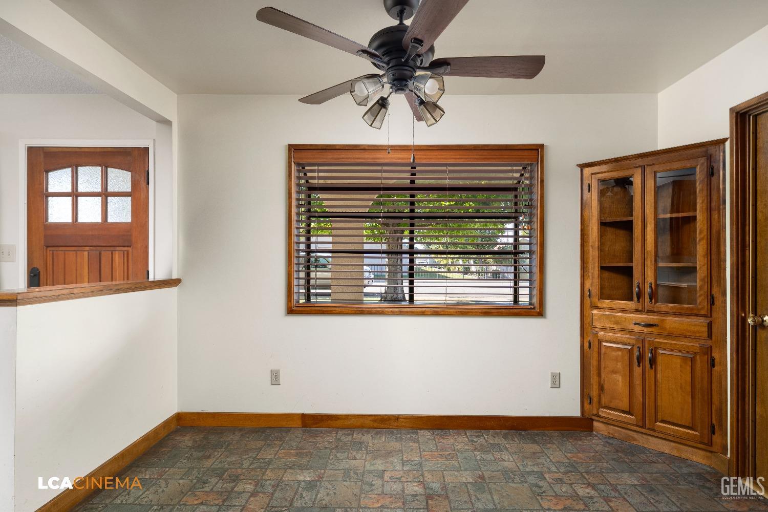 Undisclosed Address Shafter, CA 93263 - Photo 12 of 19 a view of an empty room with a window