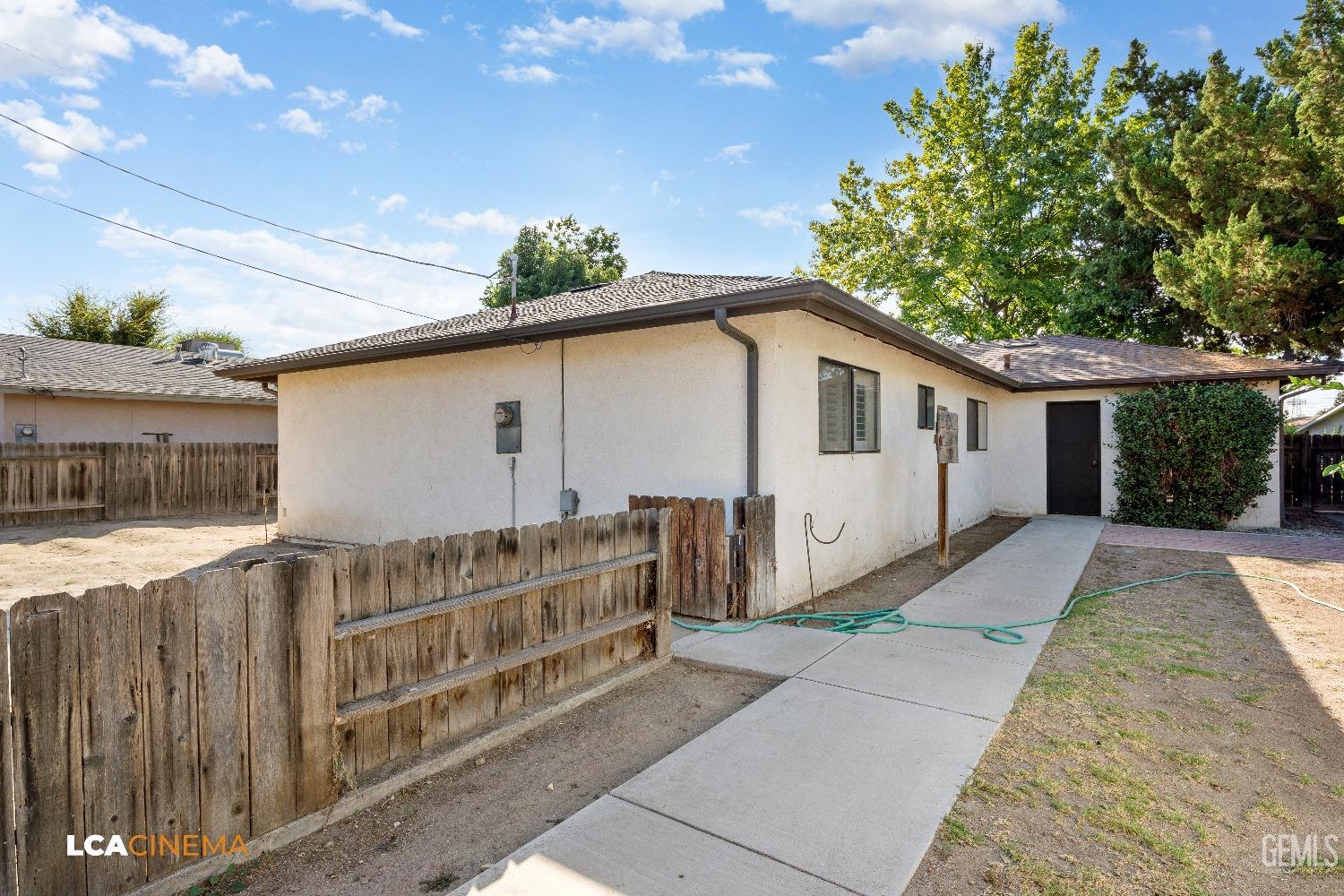 Undisclosed Address Shafter, CA 93263 - Photo 19 of 19 a view of a house with a yard