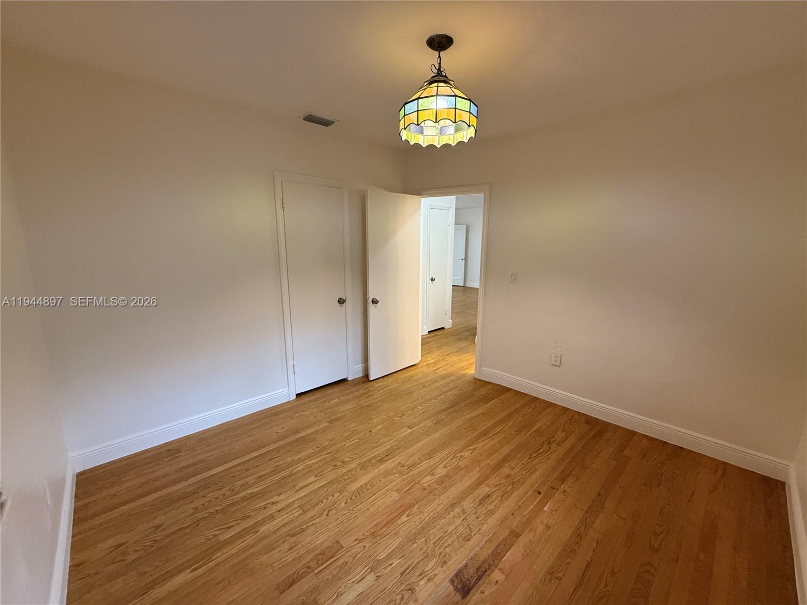 2151 Southwest 21st Terrace Miami, FL 33145 - Photo 13 of 22 a view of an empty room and a window