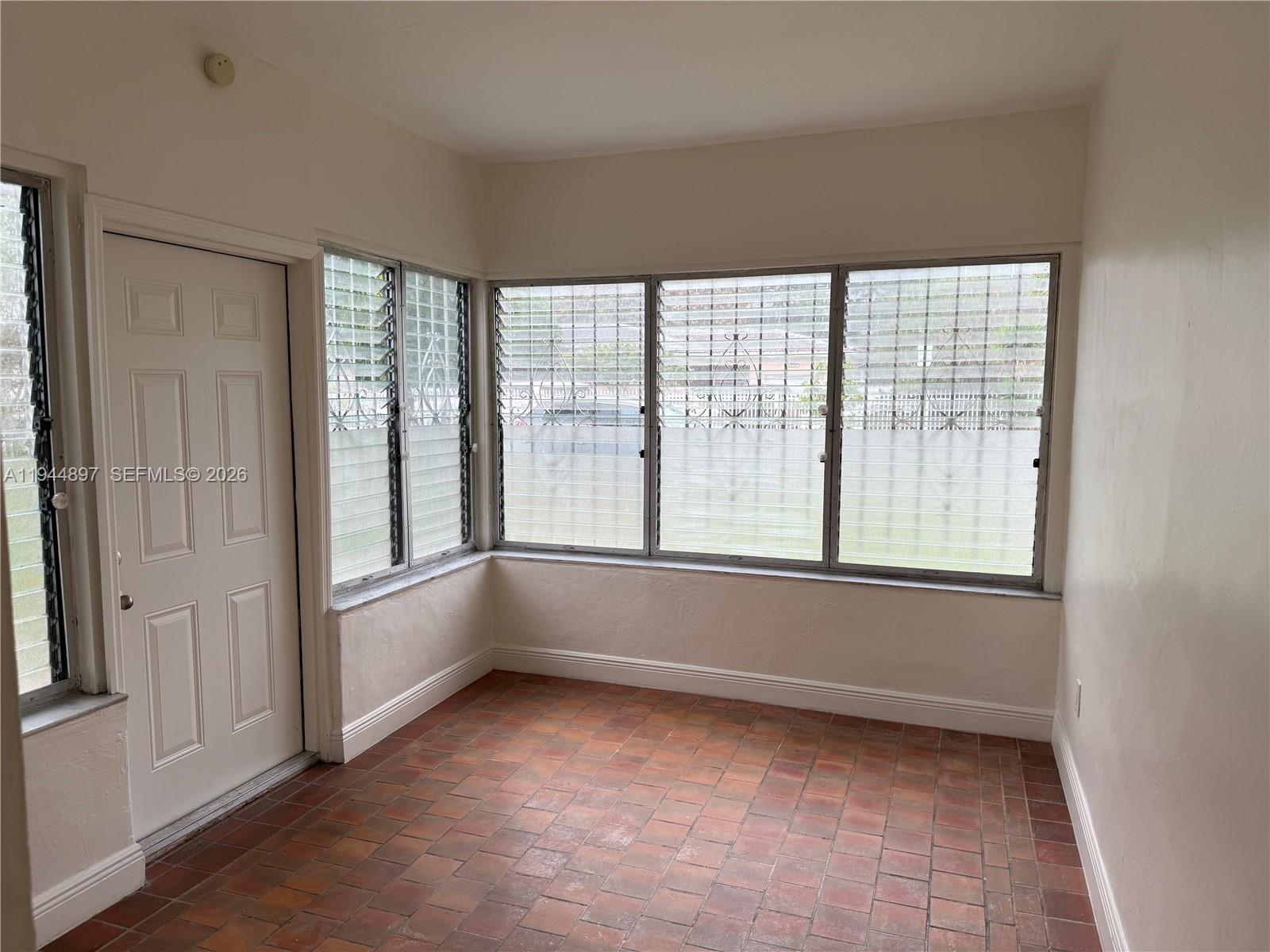 2151 Southwest 21st Terrace Miami, FL 33145 - Photo 20 of 22 a view of an empty room with a window