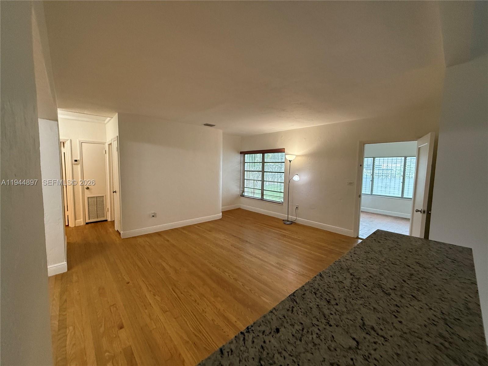 2151 Southwest 21st Terrace Miami, FL 33145 - Photo 8 of 22 a view of an empty room and window