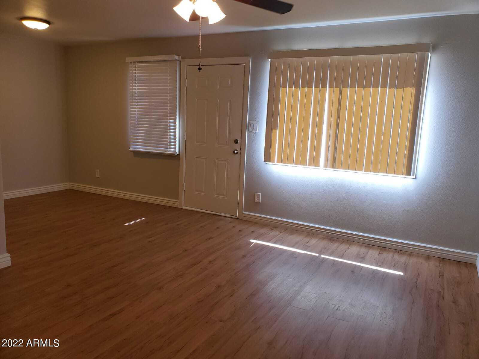 4014 West Wonderview Road Phoenix, AZ 85019 - Photo 4 of 11 living room area