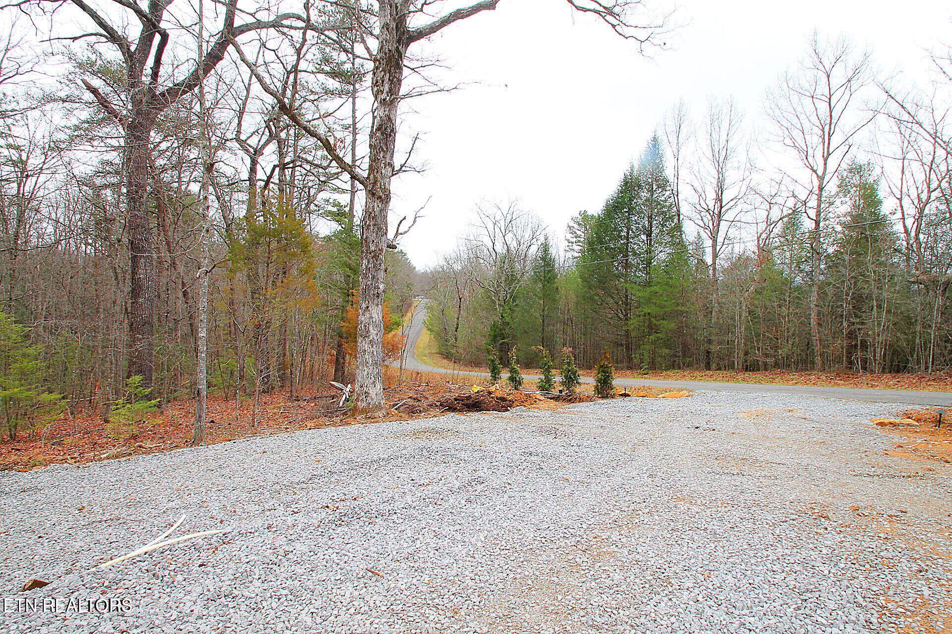 1707 Russell Ridge Road Crossville, TN 38555 - Photo 12 of 16 circular drive with landscaping for priv