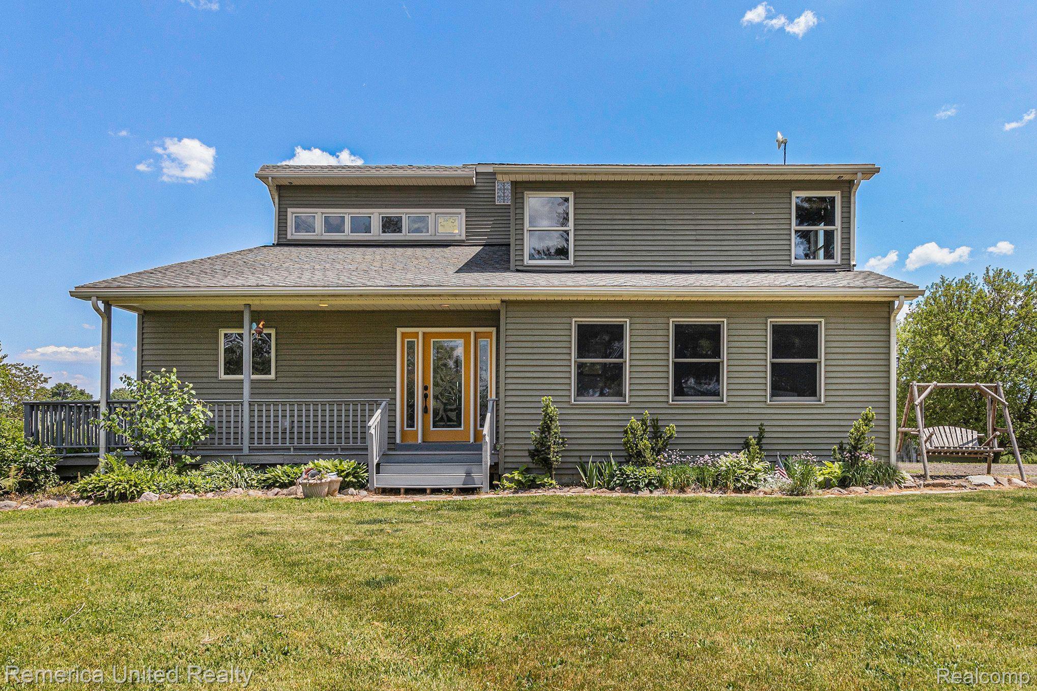 8722 North Gregory Road Fowlerville, MI 48836 - Photo 1 of 35 Custom Built Home