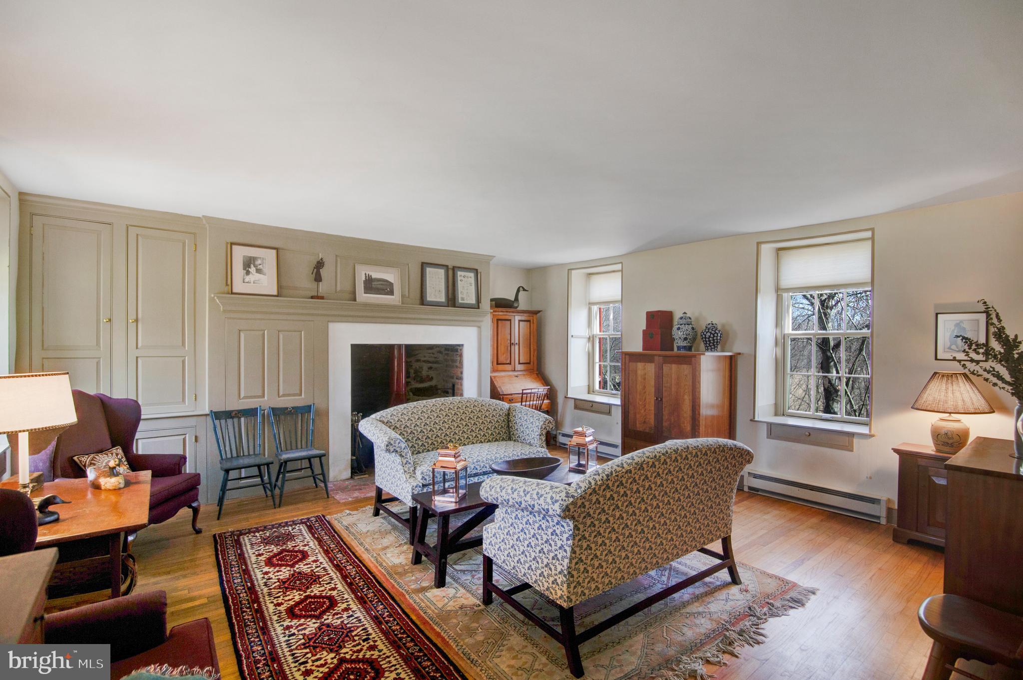 13025 Glissans Mill Road Mount Airy, MD 21771 - Photo 11 of 78 LIVING ROOM WITH PANELED WALL AND FP