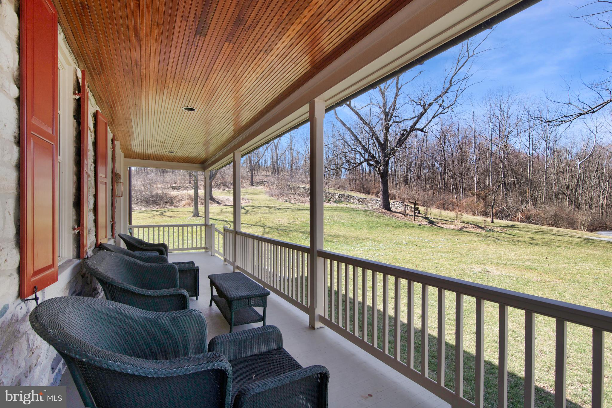 13025 Glissans Mill Road Mount Airy, MD 21771 - Photo 6 of 78 COVERED FRONT PORCH FOR SUMMER EVENINGS