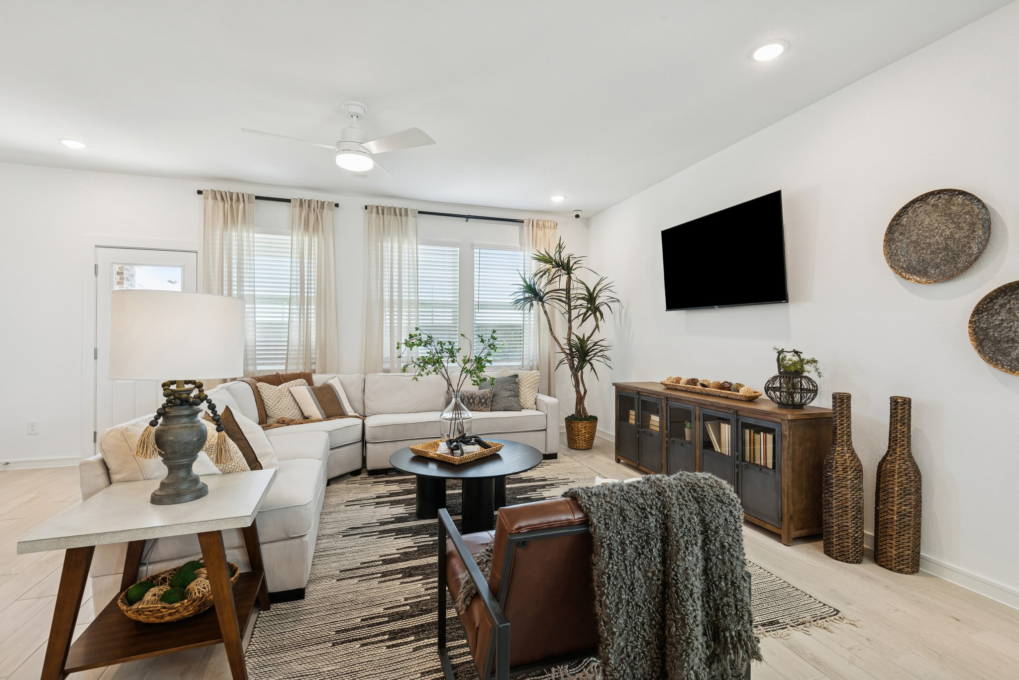 7803 Jasper Mdws Way Angleton, TX 77515 - Photo 9 of 26 Cozy great room (*Photo not of actual home and used for illustration purposes only.)