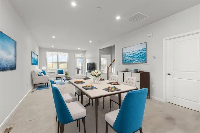 a view of a dining room with furniture
