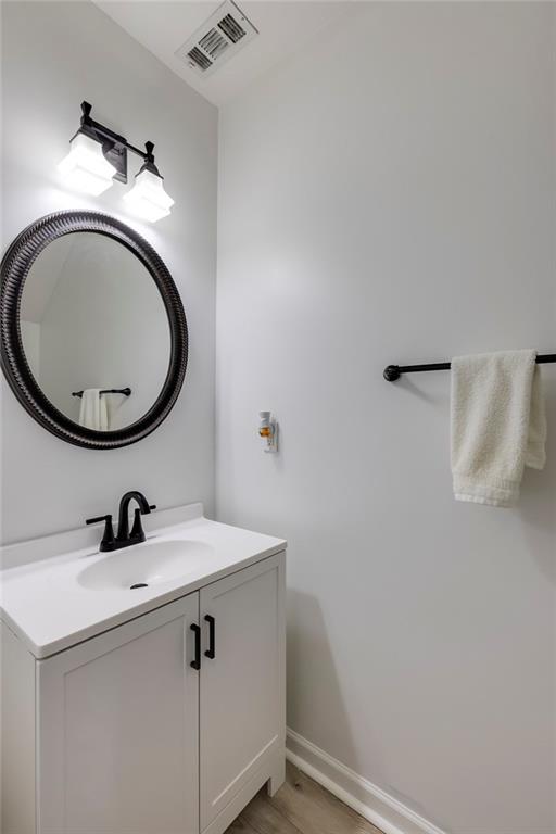 1561 Trailview Way Northeast Atlanta, GA 30329 - Photo 17 of 38 a bathroom with a sink and a mirror