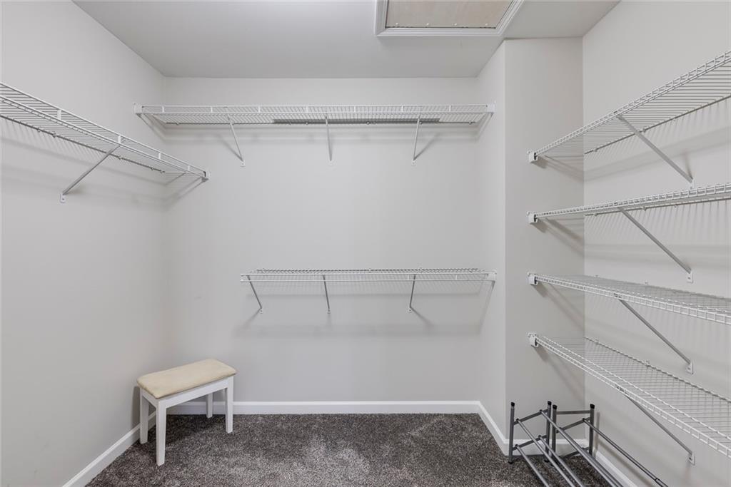 1561 Trailview Way Northeast Atlanta, GA 30329 - Photo 22 of 38 a view of a room with racks on the wall