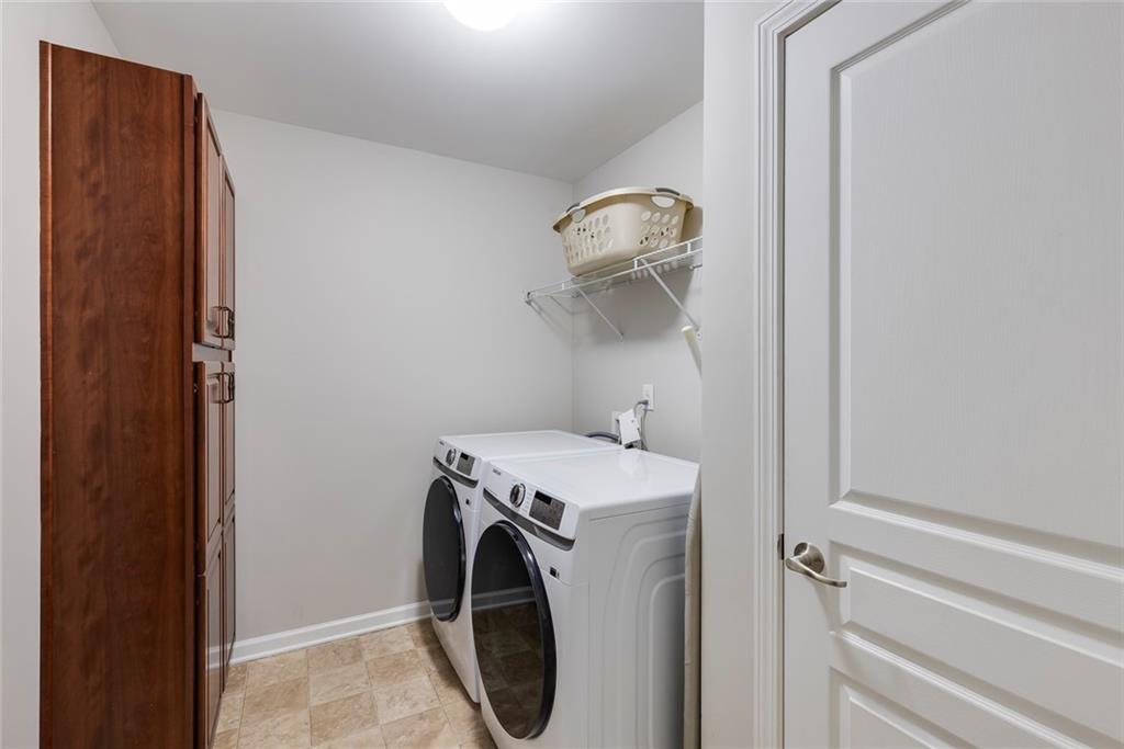 1561 Trailview Way Northeast Atlanta, GA 30329 - Photo 30 of 38 a utility room with dryer and washer