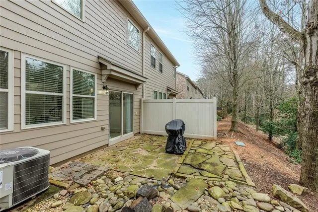 a house view with a backyard space