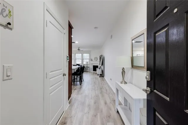 a view of a kitchen from the hallway
