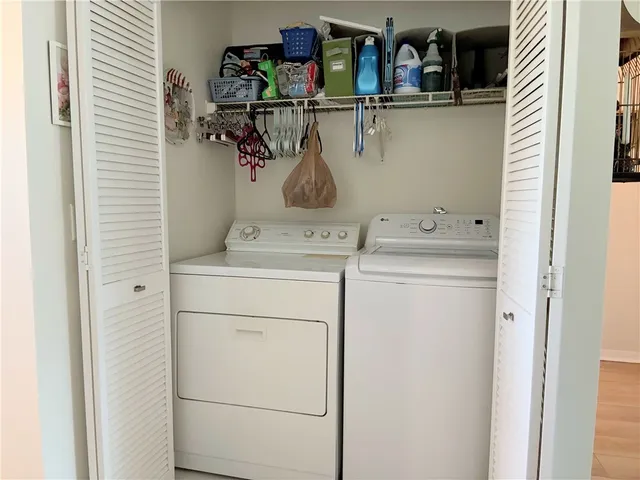 a view of a balcony with chairs