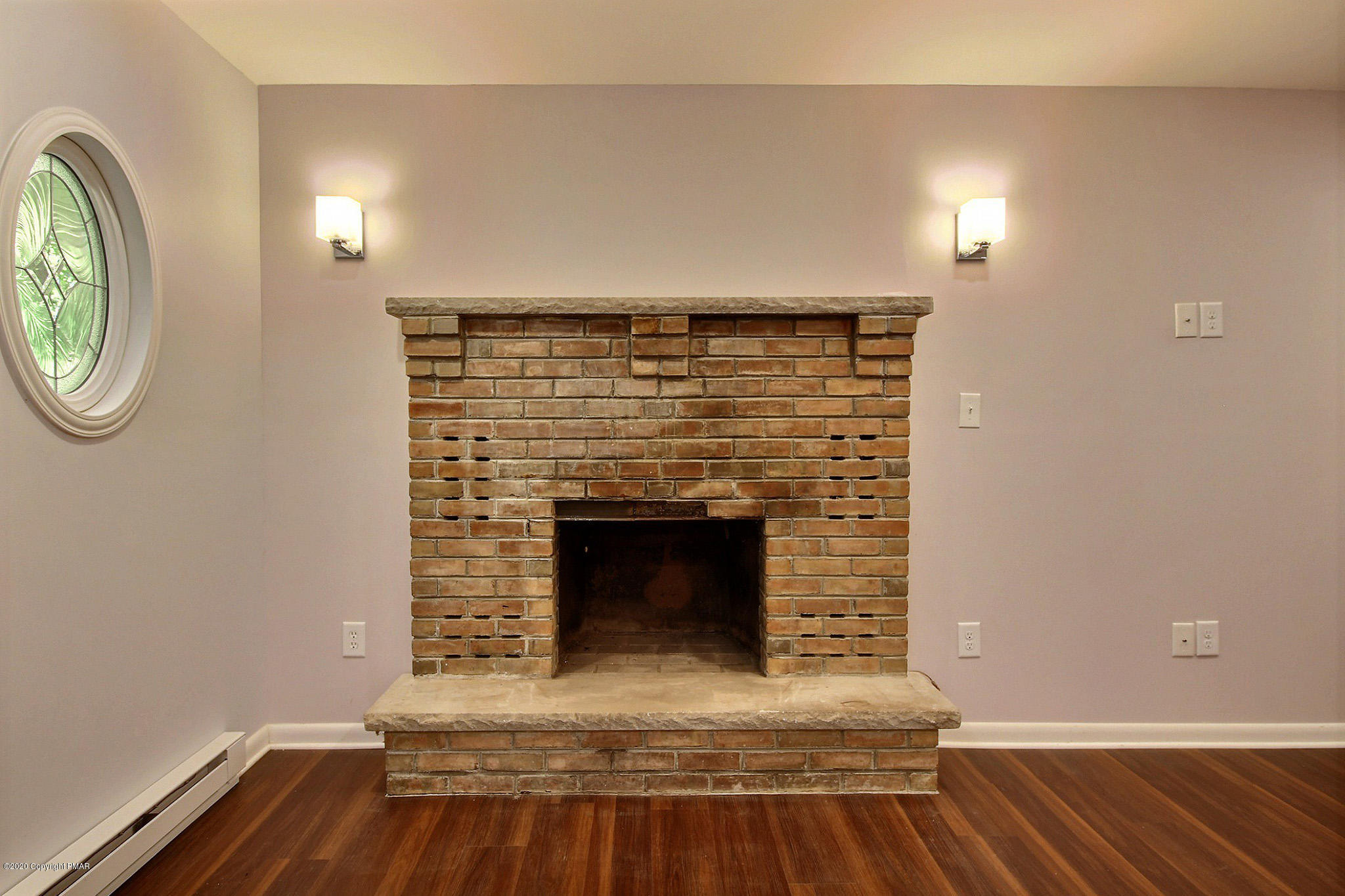 1191 Mattioli Road Bartonsville, PA 18321 - Photo 5 of 17 a living room with furniture and a fireplace