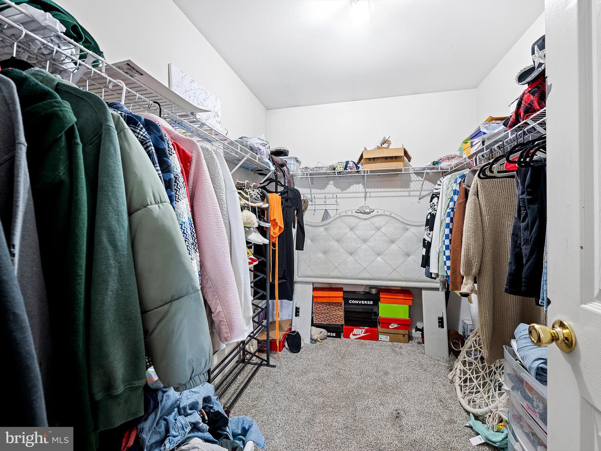 103 Osprey Court Camden Wyoming, DE 19934 - Photo 19 of 34 a view of walk in closet with clothes