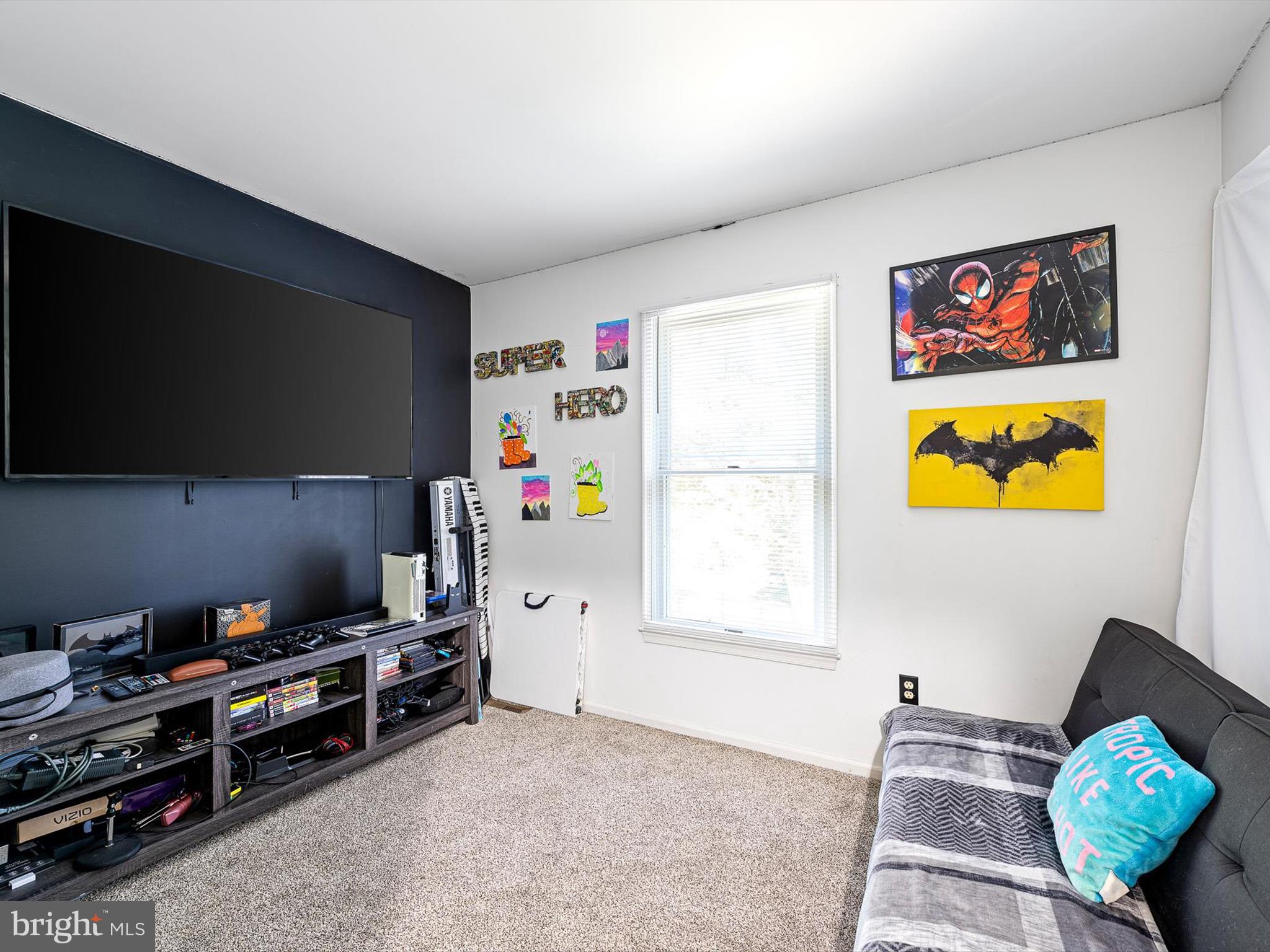 103 Osprey Court Camden Wyoming, DE 19934 - Photo 24 of 34 a bedroom with furniture and a window