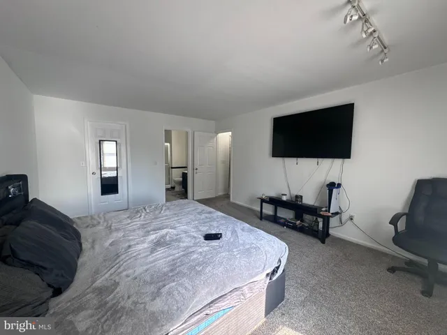 a view of a deck with wooden floor and seating space