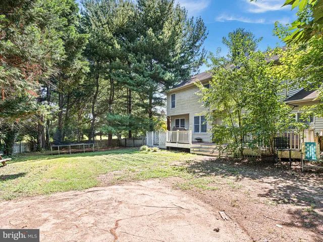 a view of a deck with a yard
