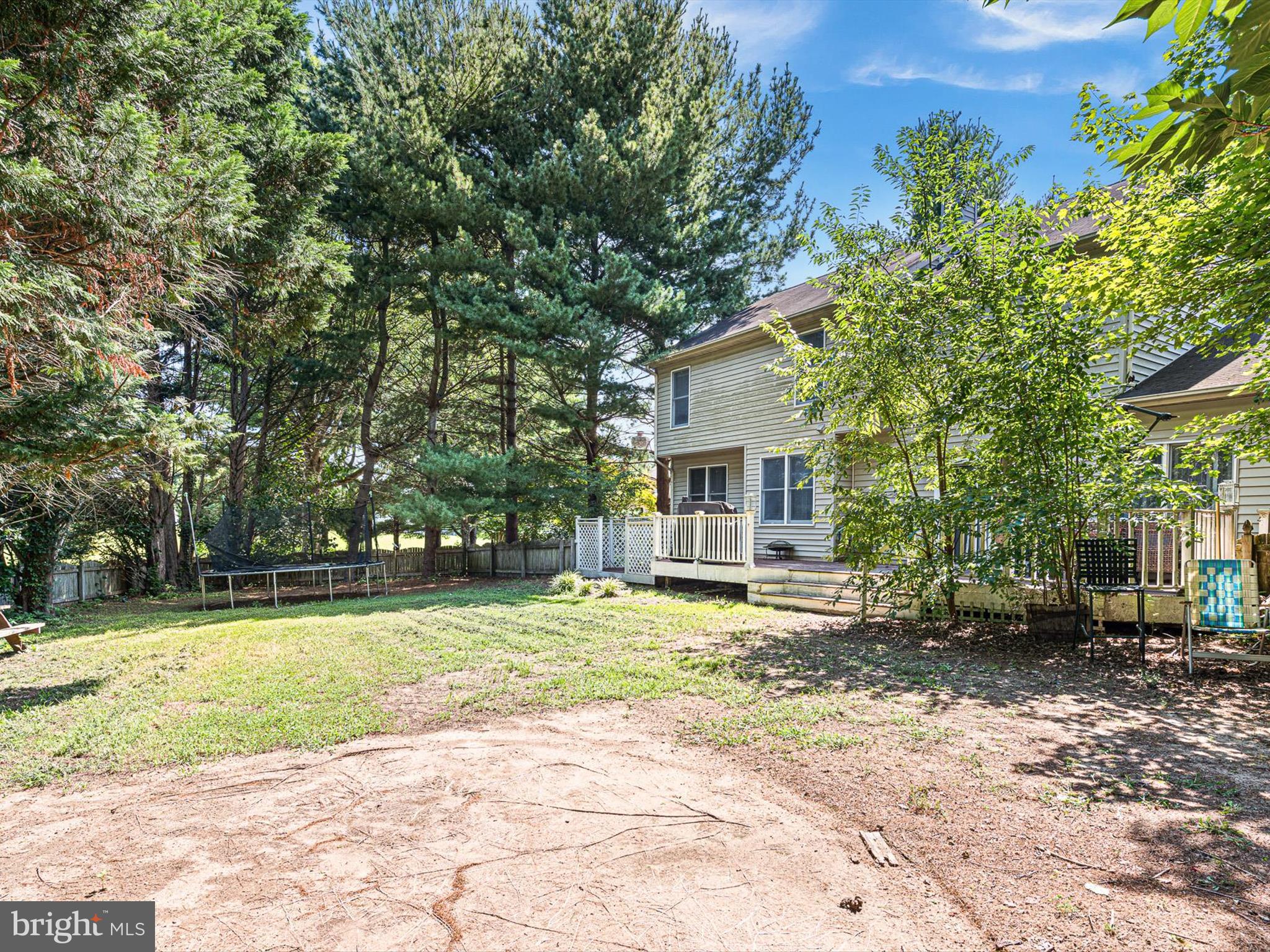 103 Osprey Court Camden Wyoming, DE 19934 - Photo 33 of 34 a view of a house with backyard and sitting area