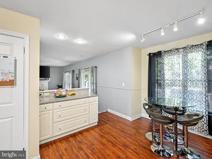 a room with furniture and a window