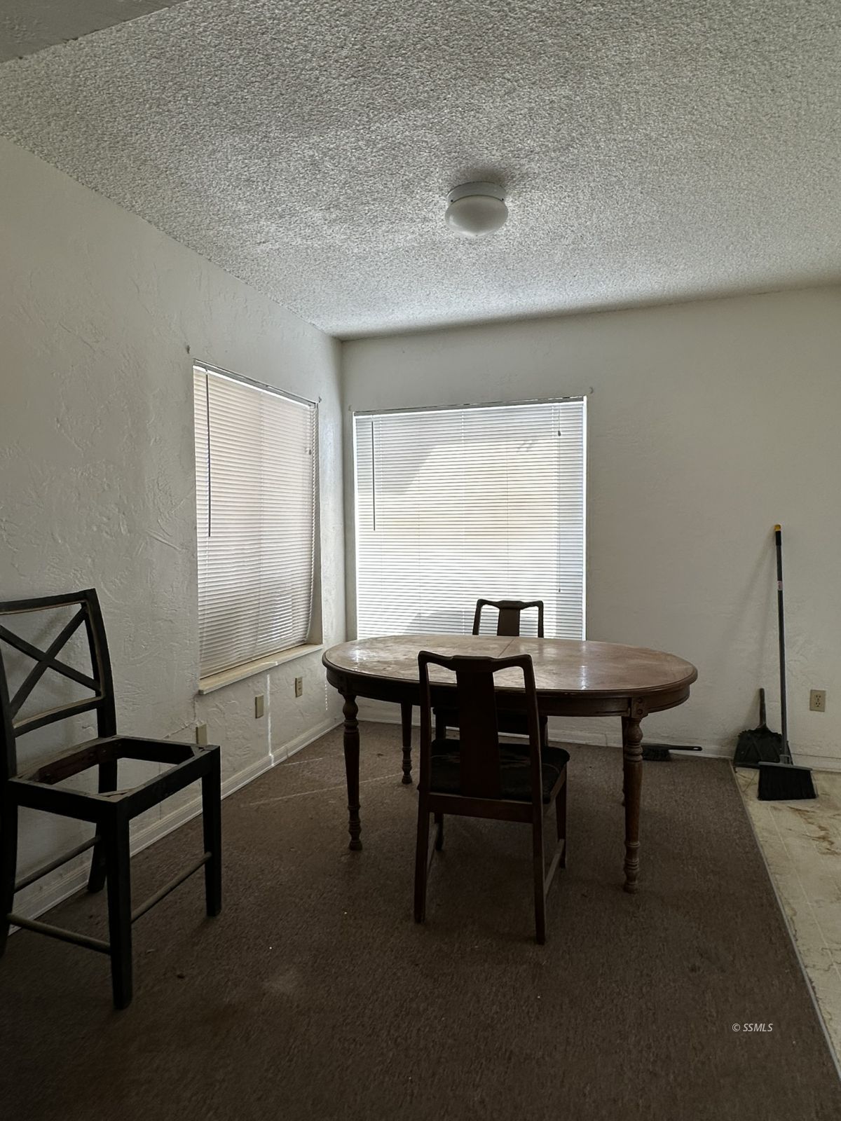 301 South Richmond Road Ridgecrest, CA 93555 - Photo 10 of 45 a view of a workspace with furniture and a window
