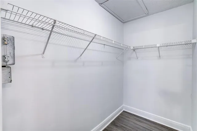 a view of a room with racks on the wall