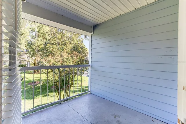 a view of a room with a large window