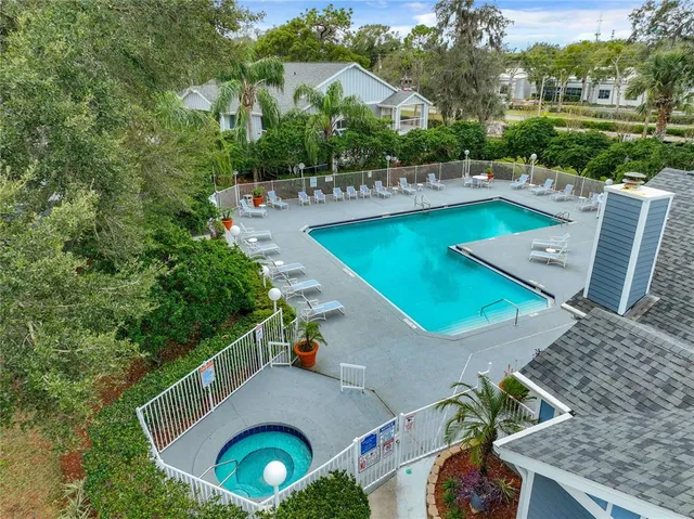 an aerial view of a house with outdoor space