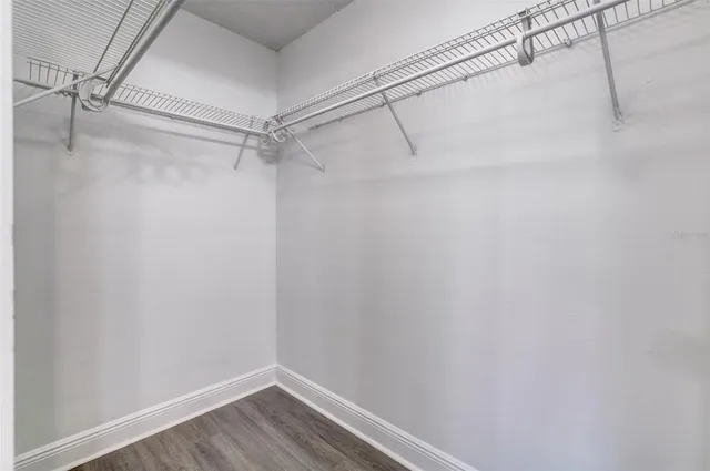 a view of a room with racks on the wall