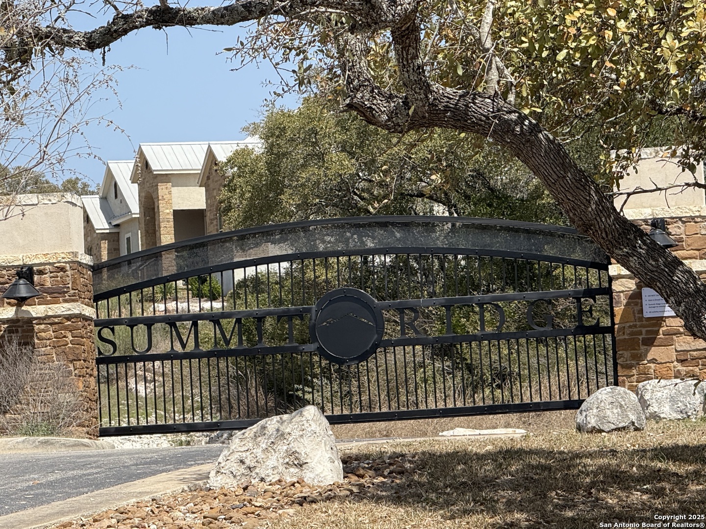 Pr 2775th Mico, TX 78056 - Photo 2 of 7 a view of a brick house with large windows