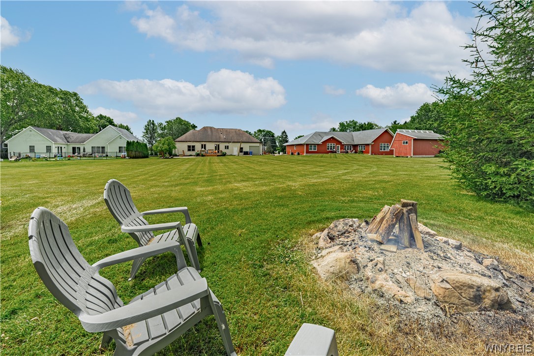 4899 Beach Ridge Road Pendleton, NY 14094 - Photo 43 of 48 Wood burning fire pit in the back yard