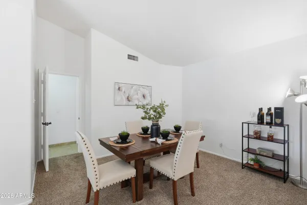 a view of a dining room with furniture
