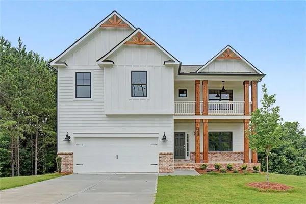 a view of front a house with a yard