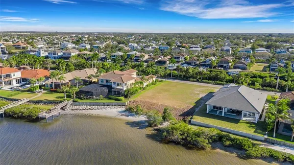 an aerial view of a house with a garden