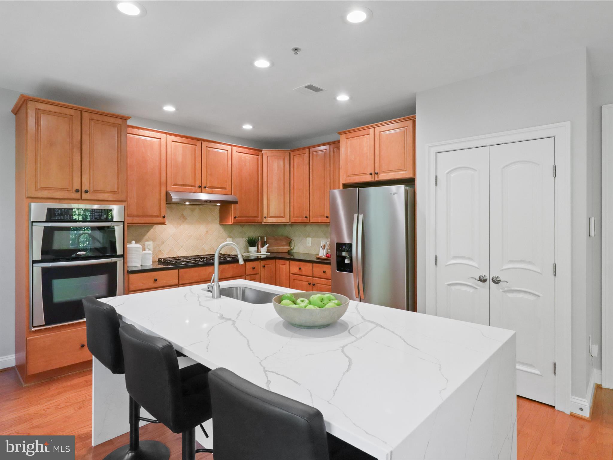 1781 Chain Bridge Road, Unit 303 McLean, VA 22102 - Photo 34 of 56 Wood Cabinetry and Stainless Steel Appliances