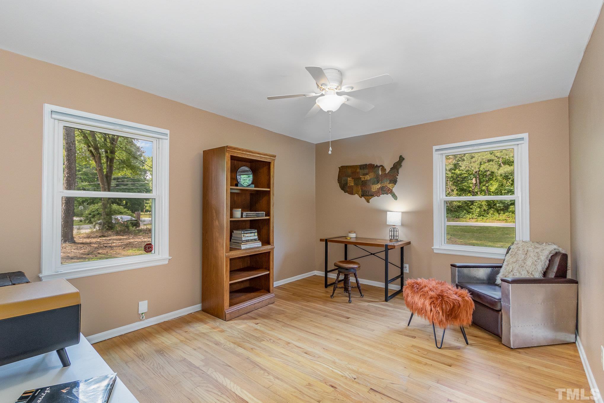 1712 Riverview Road Raleigh, NC 27610 - Photo 18 of 27 a living room with furniture wooden floor and a window