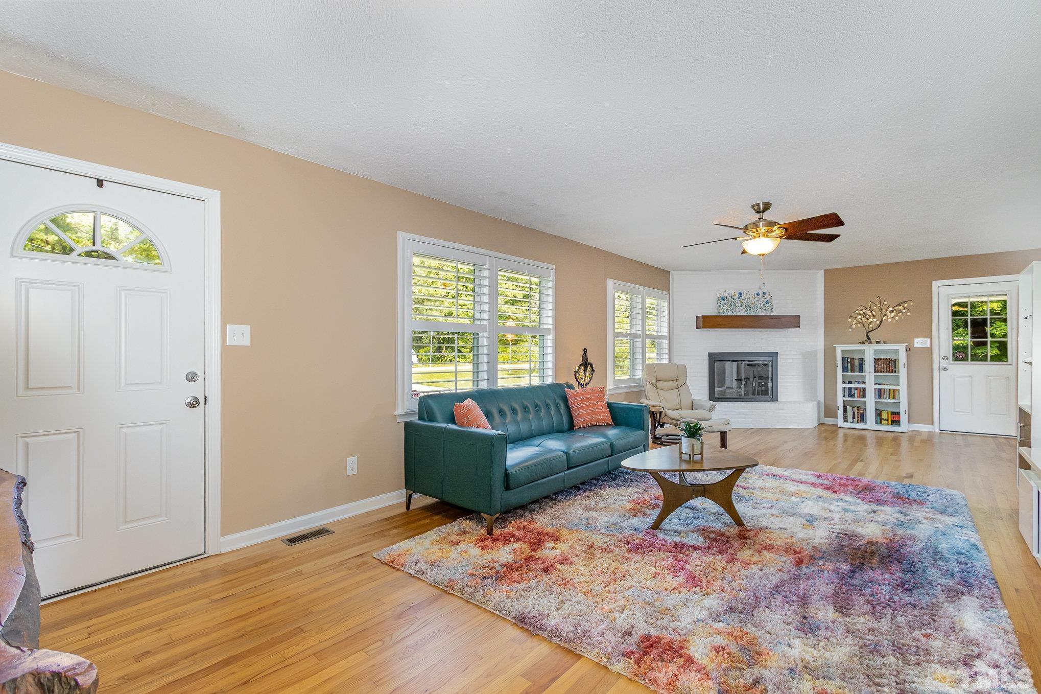 1712 Riverview Road Raleigh, NC 27610 - Photo 7 of 27 a living room with furniture and a couch