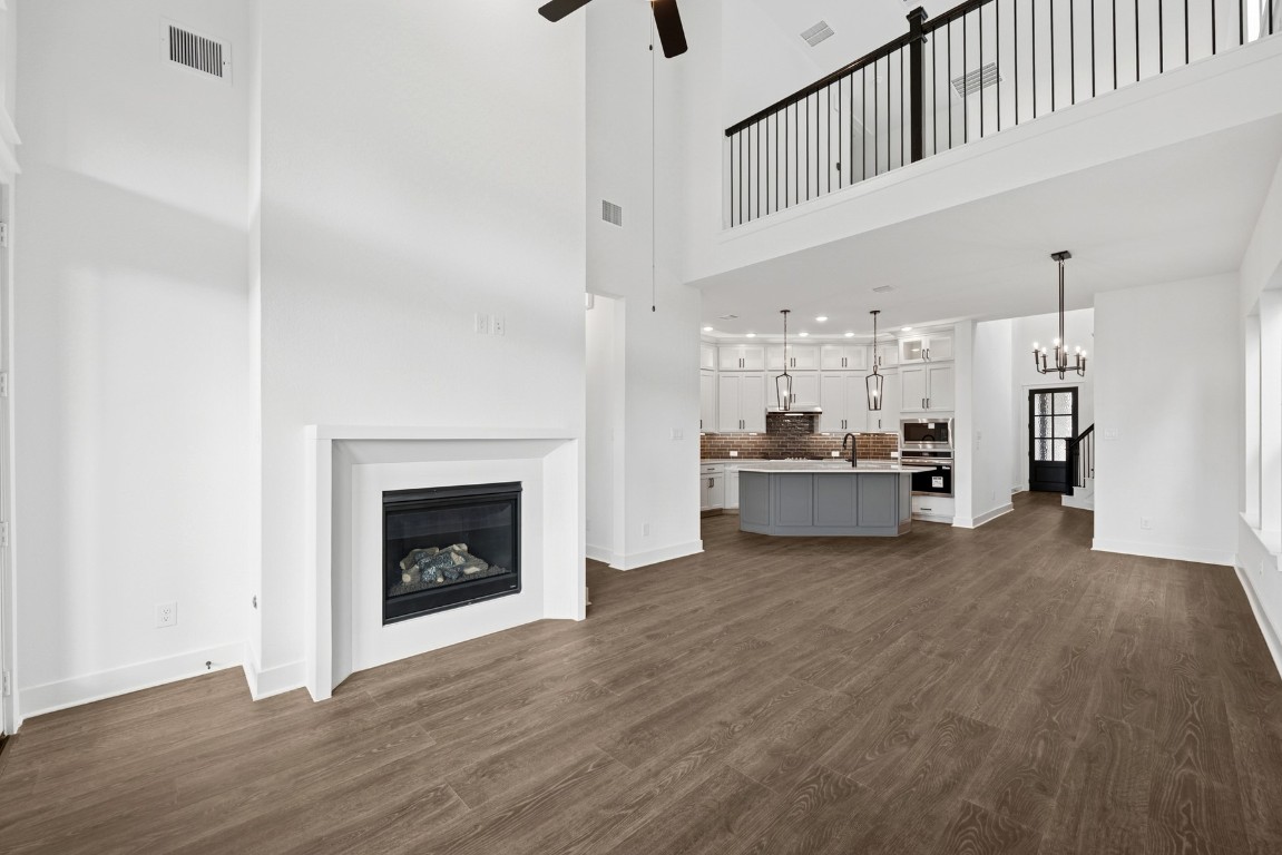 8731 Mancos Valley Porter, TX 77365 - Photo 25 of 46 a living room with furniture and a fireplace