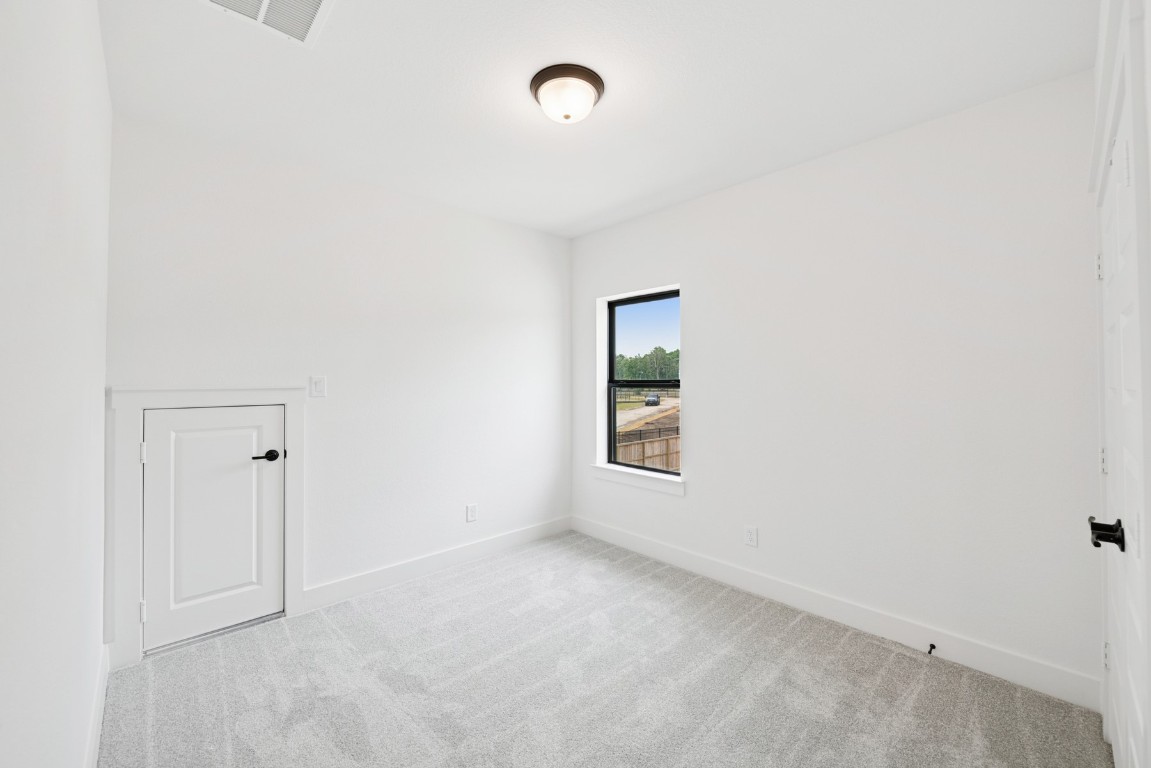 8731 Mancos Valley Porter, TX 77365 - Photo 38 of 46 a view of an empty room with a window