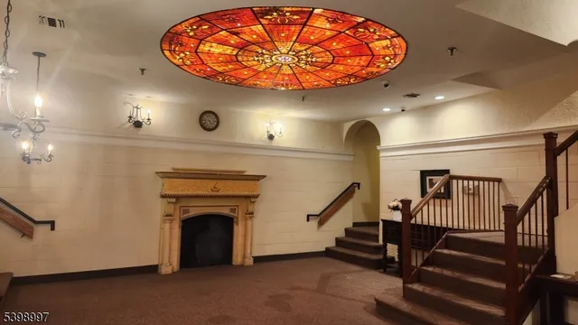a kitchen with a refrigerator and a sink