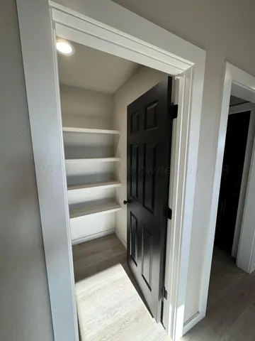 a bathroom with a granite countertop sink mirror and double