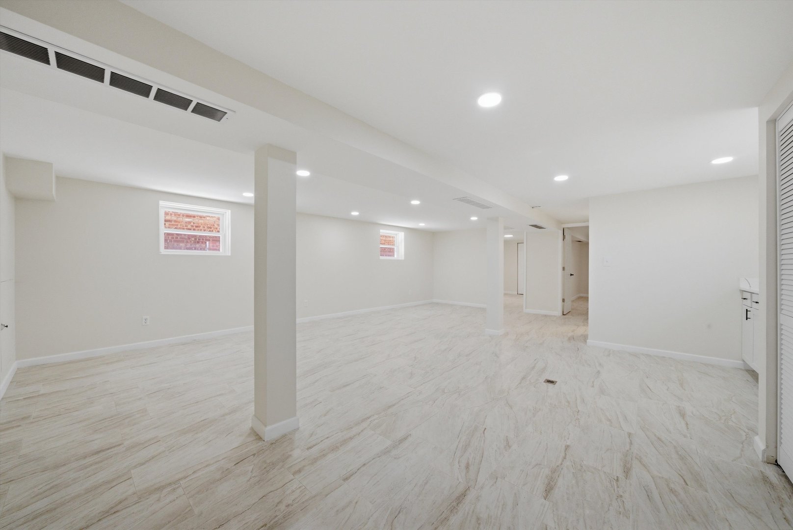 3907 West Marquette Road Chicago, IL 60629 - Photo 19 of 32 a view of a hallway with wooden floor