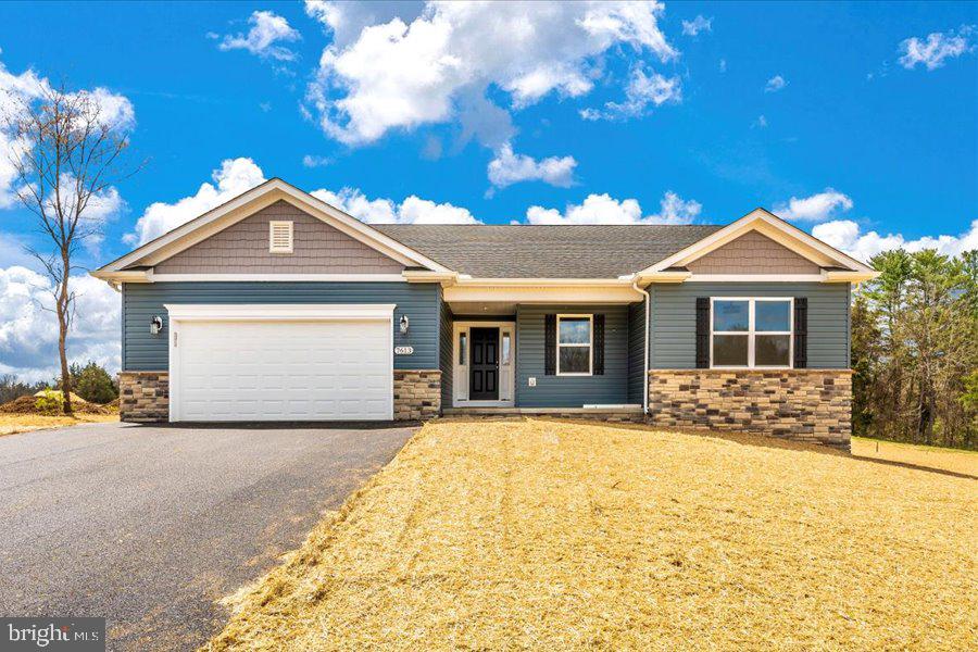 21913 Durberry Road Smithsburg, MD 21783 - Photo 1 of 1 a front view of a house with a yard