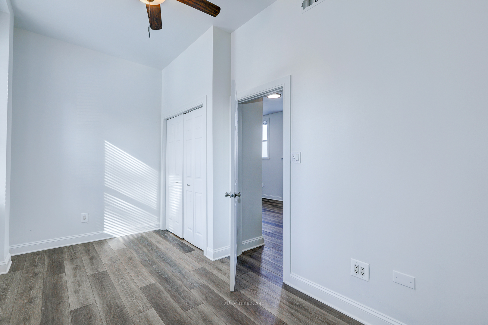 224 Lemont Street, Unit 5 Lemont, IL 60439 - Photo 11 of 21 a view of an empty room with wooden floor