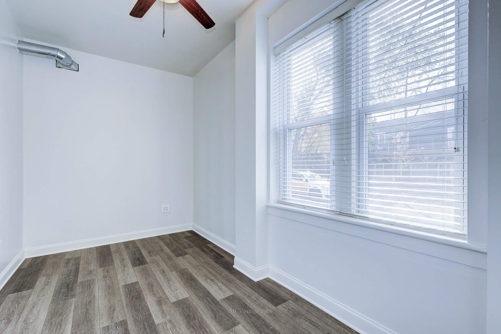 224 Lemont Street, Unit 5 Lemont, IL 60439 - Photo 12 of 21 a view of a room that has a window in it