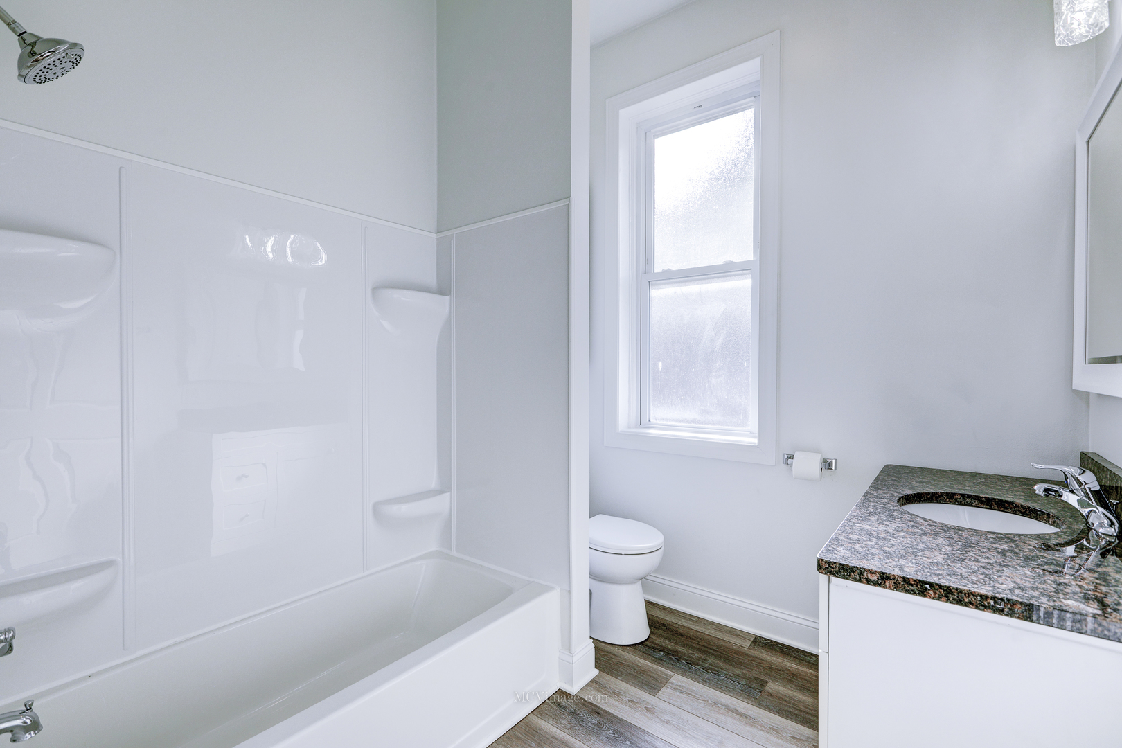 224 Lemont Street, Unit 5 Lemont, IL 60439 - Photo 14 of 21 a bathroom with a granite countertop sink toilet and shower