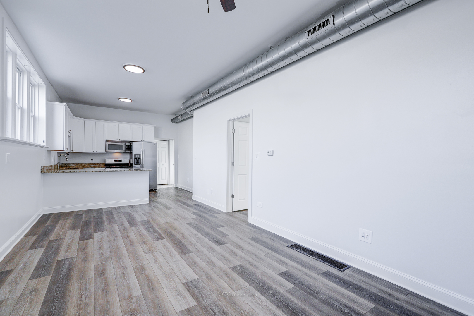 224 Lemont Street, Unit 5 Lemont, IL 60439 - Photo 5 of 21 a view of kitchen with wooden floor